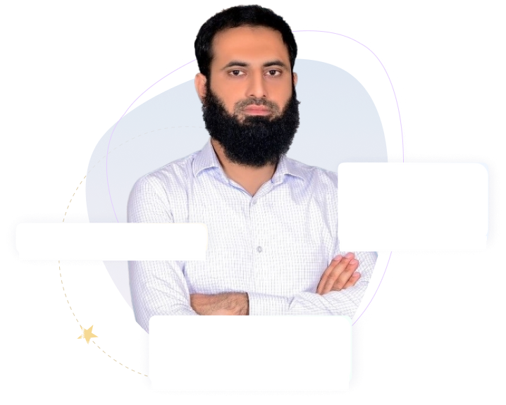 Portrait of Dr. Hafiz Atif, standing with arms folded